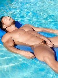 Naked men in pool