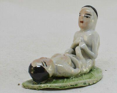 Erotic mudman chinese figurine photo