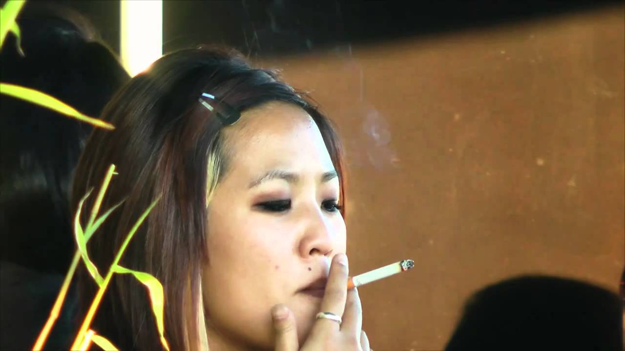 Asian chick smoking