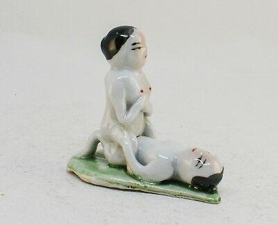 Erotic mudman chinese figurine