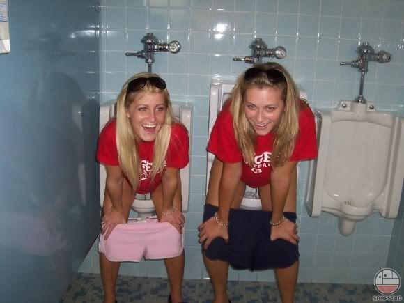 Girls pissing in urinals