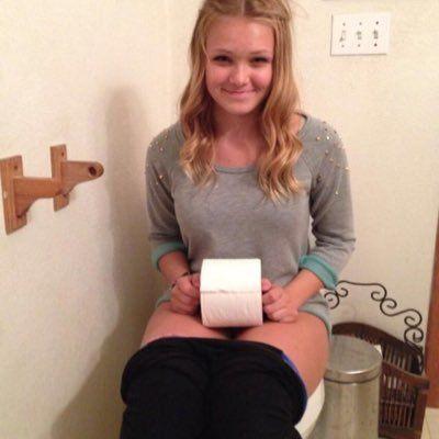 Girl in piss toilet